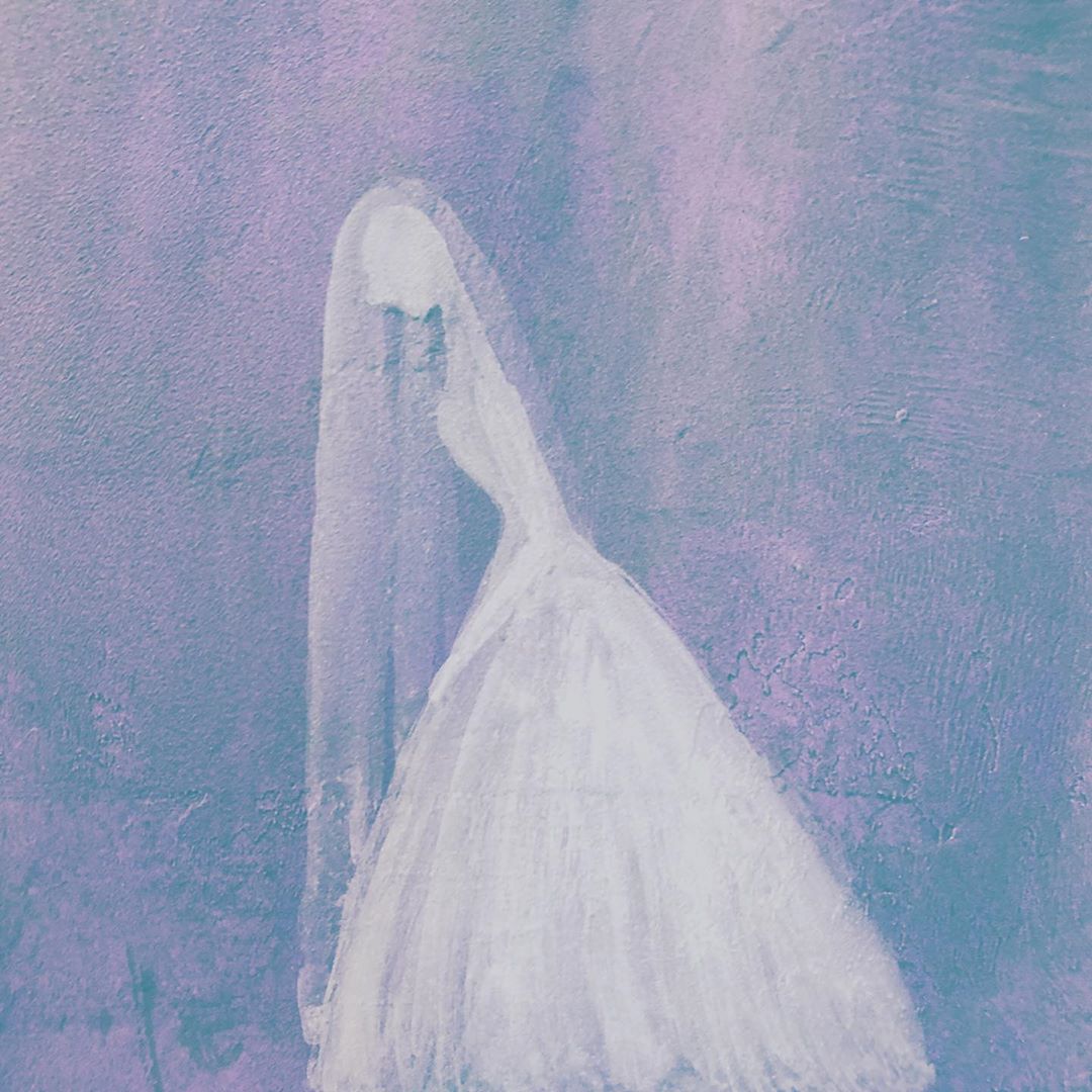 A bride with her veil snatched away