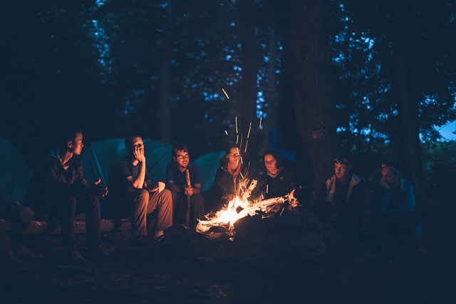 A group around the campfire