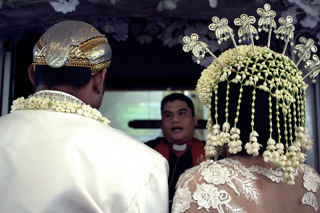 Priest performing a marriage ceremony