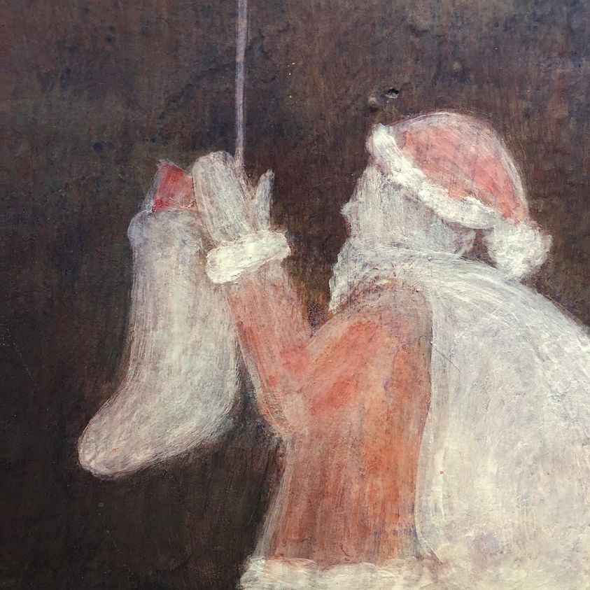 Santa Claus filling stockings furtively